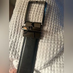 Men’s Belt.Black. Shiny bronze buckle. 40 inch length NWOT